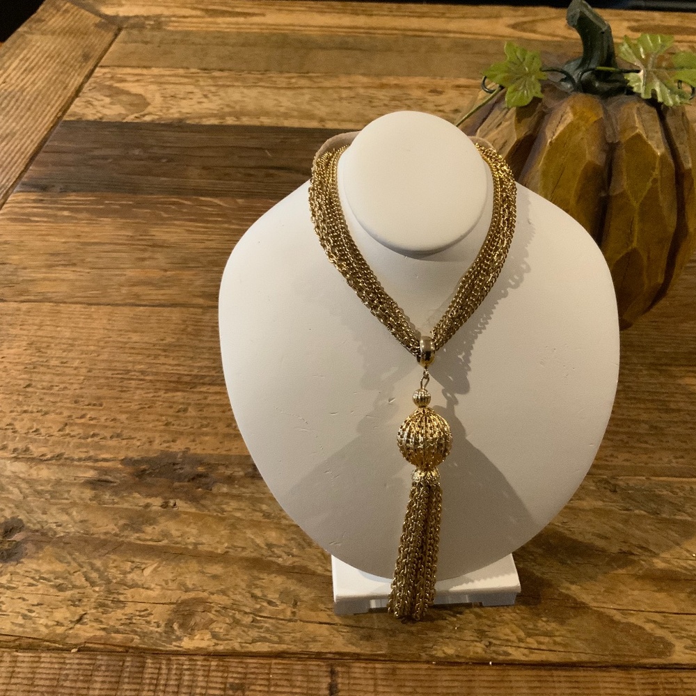 Gold tone tassel necklace